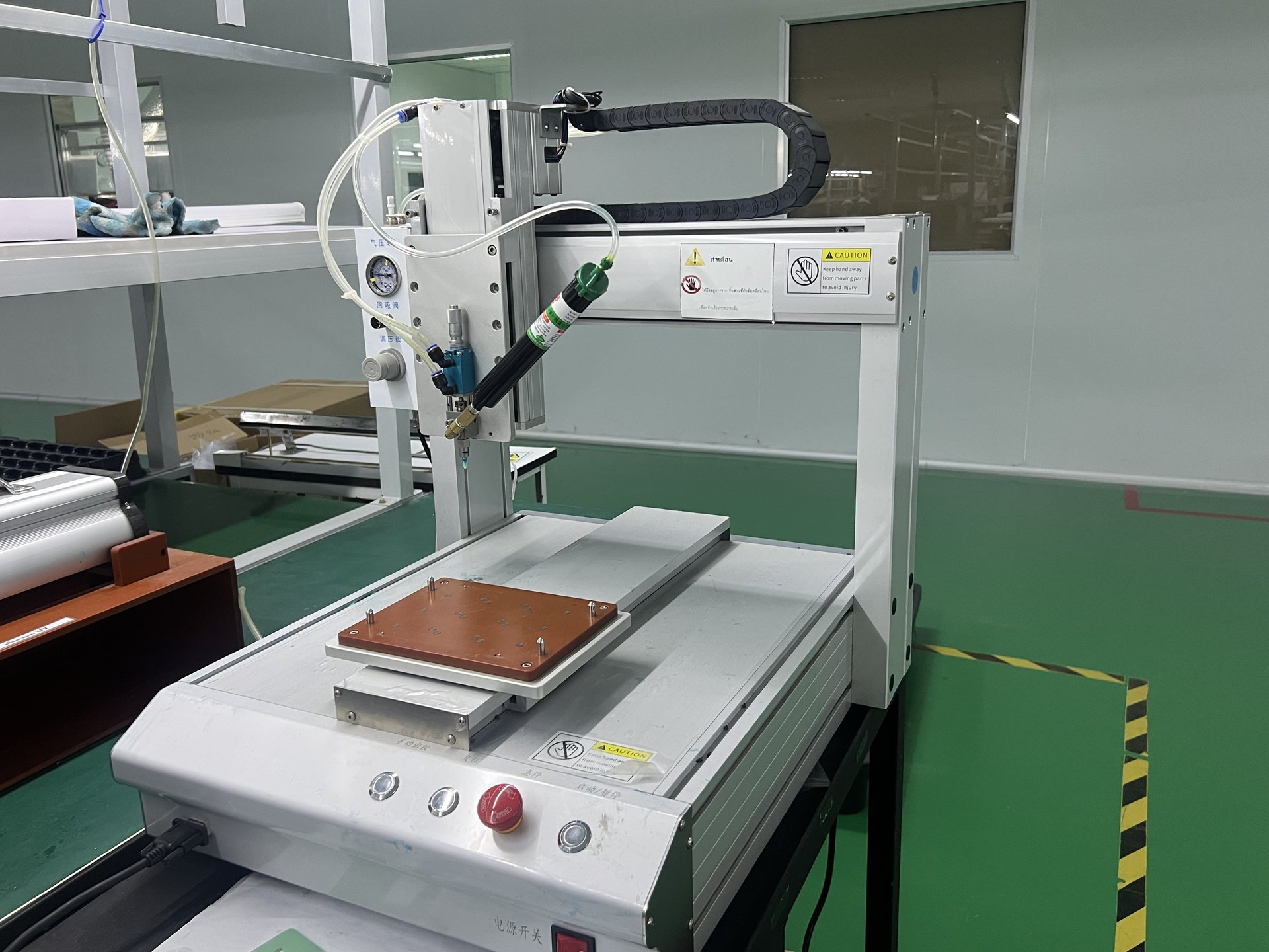 Auto glue dispenser with vision system and PCBA coordinate overlay on monitor