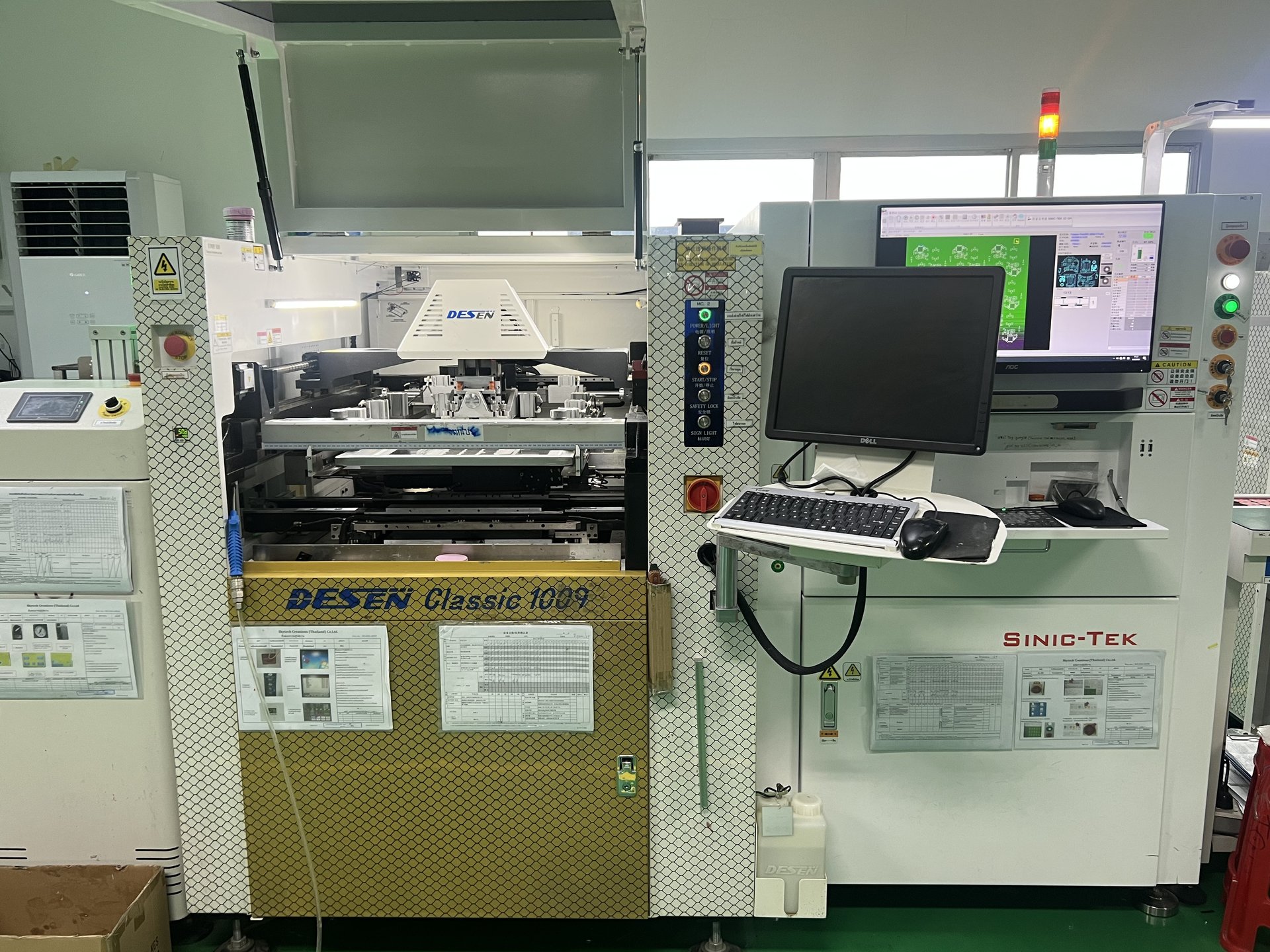DESEN Classic 1009 SMT stencil printer and SINIC-TEK 3D SPI with DELL monitor showing process control